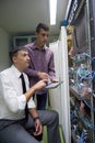 Network engineers in server room Royalty Free Stock Photo