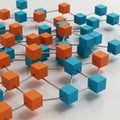 A network of interconnected cubes in orange and blue colors. The Royalty Free Stock Photo