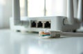 Network router with plugged ethernet cable near its ports. Device for internet connection and data transfer. Wireless antennas Royalty Free Stock Photo