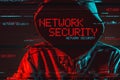 Network security concept with faceless hooded male person