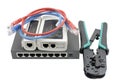 Network switch, ethernet cable, crimper and RJ45 cable tester Royalty Free Stock Photo