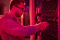 Network technician fixing supercomputer