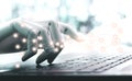 Network technology robot concept or robot hand chatbot pressing computer keyboard Royalty Free Stock Photo