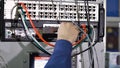 Networking service. network engineer administrator checking server hardware equipment of data center