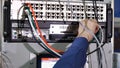 Networking service. network engineer administrator checking server hardware equipment of data center