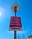 Neumuenster, Germany - 16. April 2022: An election poster of the German party named Die Partei on a lamppost before the state Royalty Free Stock Photo