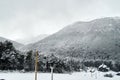 View of ski center from cable car surrounded by snowy trees and mountains at Cerro Bayo Bayo Hill in Villa La Angostura