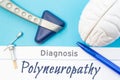 Neurological diagnosis of Polyneuropathy. Neurological hammer, human brain figure, tools for sensitivity testing are next to title