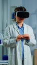 Neurological scientist using medical inovation in lab wearing VR glasses Royalty Free Stock Photo