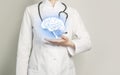 Neurologist doctor, brain specialist. Aesthetic handdrawn highlighted illustration of human brain. Neutral grey background, studio Royalty Free Stock Photo