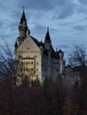 Neuschwangau castle Autumn forest twilight Royalty Free Stock Photo