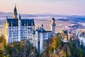 Neuschwanstein, beautiful fairytale castle near Munich in Bavaria, Germany, with colorful trees.