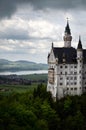 Neuschwanstein Castle: Dramatic Cloudy Skies w/ Village in Background