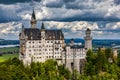 Neuschwanstein Fairytale Castle near Fussen, Bavaria, Germany. View of famous Neuschwanstein Castle. Location: village of Royalty Free Stock Photo