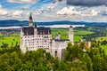 Neuschwanstein Fairytale Castle near Fussen, Bavaria, Germany. View of famous Neuschwanstein Castle. Location: village of Royalty Free Stock Photo