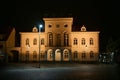 Neustrelitz town hall illuminated at night on the market place in the centre of the city, black sky, Mecklenburg-Vorpommern,