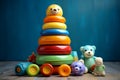 Neutral background hosts a playful array of baby toys