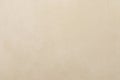 Neutral textured wall surface with subtle variations in color and tone for an inviting backdrop in various settings Royalty Free Stock Photo