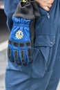 The gloves of a volunteer of the German `Technisches Hilfswerk` Federal Agency for Technical Relief with the sign `THW`