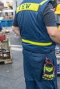 A volunteer of the German `Technisches Hilfswerk` Federal Agency for Technical Relief with the sign `THW` on his back