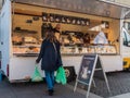 Neuwied, Germany - March 26, 2021: a market stand on a farmer`s market offering a variety of different kinds of cheese