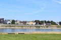 Neuwied, Germany - 07 18 2022: Neuwieder Deich, flood dam with Pegelturm and the town behind it