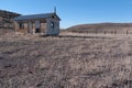Old ranch homestead, stark desert setting