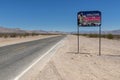 A State of Nevada welcome sign along a road in the desert near Death Valley