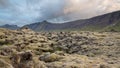 Never-ending Lava fields in Iceland with mountains