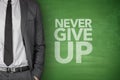 Never give up blackboard Royalty Free Stock Photo
