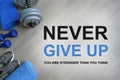 Never Give Up. You Are Stronger Than You Think. Fitness motivational quotes. Royalty Free Stock Photo