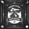Never stop exploring on chalkboard. Vector illustration. Concept for shirt or logo, print, stamp or tee. Vintage Royalty Free Stock Photo