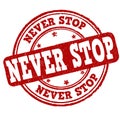 Never stop grunge rubber stamp Royalty Free Stock Photo