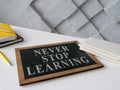 Never stop learning on the blackboard about lifelong education.