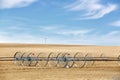 A new agricultural wheel line sprinkler. Royalty Free Stock Photo