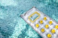 New air mattress floating on clear swimming pool water, summer concept Royalty Free Stock Photo