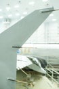 New aircraft component undergoes assembly process in high-tech workshop with bright overhead lights and advanced tools present Royalty Free Stock Photo