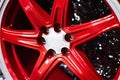 new alloy car wheel closeup, red color Royalty Free Stock Photo