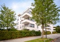 New apartment building, modern residential development with outdoor facilities in a green urban settlement