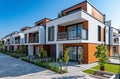 a new apartment building with modern townhouses that stand at the end of the street Royalty Free Stock Photo