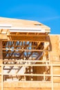 New apartment building under construction on sunny day on blue sky background. Royalty Free Stock Photo