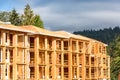 New apartment building under construction on sunny day on blue sky background. Royalty Free Stock Photo