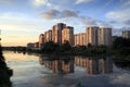 New apartment buildings on the river bank at sunset. Balashikha, Russia.