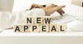 New Appeal text on wooden cubes.