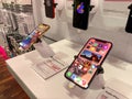 The new Apple iPhone 12 and 12 Pro on display at the T Mobile store Royalty Free Stock Photo