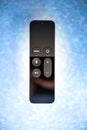 New Apple TV Remote 4k isolated sparkle holiday background