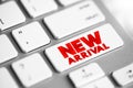 New Arrival text button on keyboard, concept background Royalty Free Stock Photo