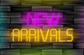 New arrivals neon inscription. Light sign on black brick wall background.