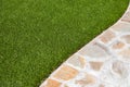 New Artificial Grass Installed Near Walkway. Royalty Free Stock Photo