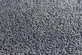 New asphalt on the road close-up. Black asphalt background Royalty Free Stock Photo